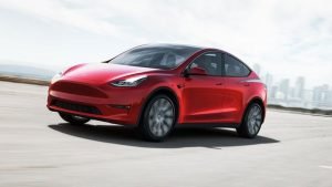Elon Musk’s Tesla reports record sales and profits